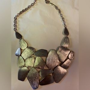 Brushed metal statement gold necklace.